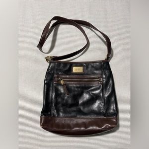 Tignanello crossbody bag. Black and brown leather with signature lining